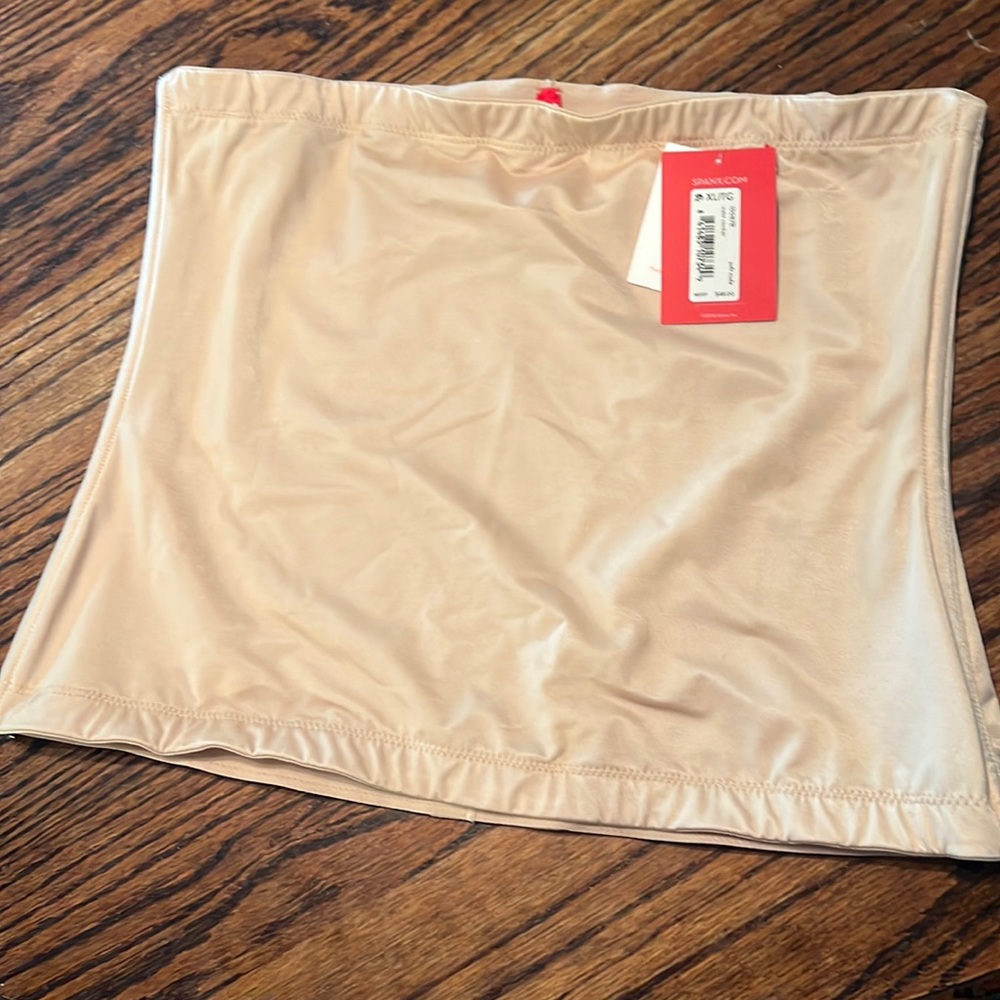 Spanx waist cincher.  Brand new